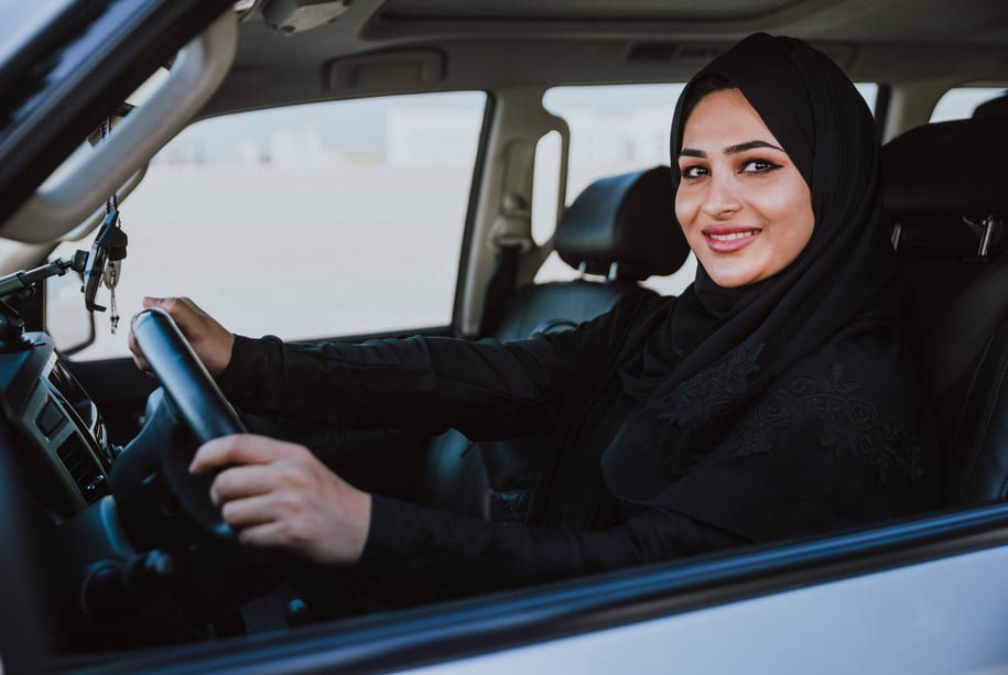 Beautiful Woman in Dubai Driving a Car